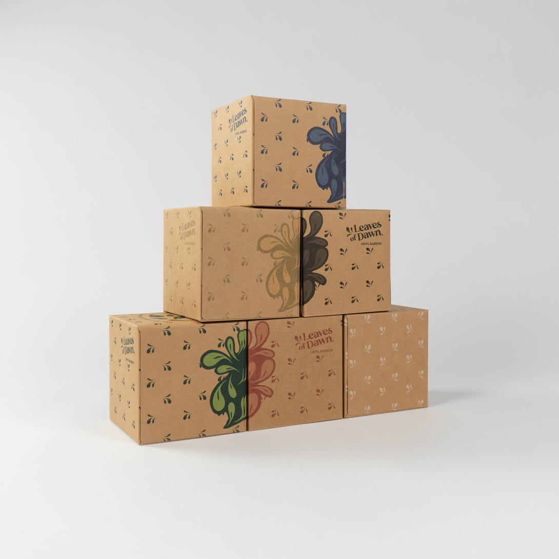 A box of Leaves of Dawn 3-ply bamboo facial tissues, a sustainable and gentle choice for sensitive skin.